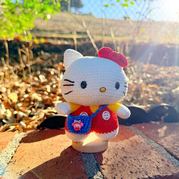 Handmade Crochet Hello Kitty Plush – Kawaii Red Overalls Amigurumi Doll - Picture 7 of 8